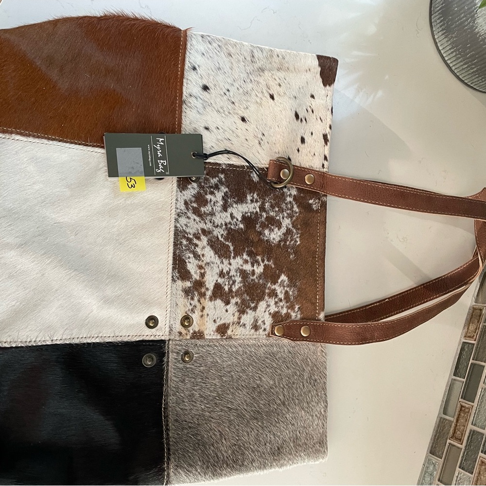 S1163 multi patch cowhide tote